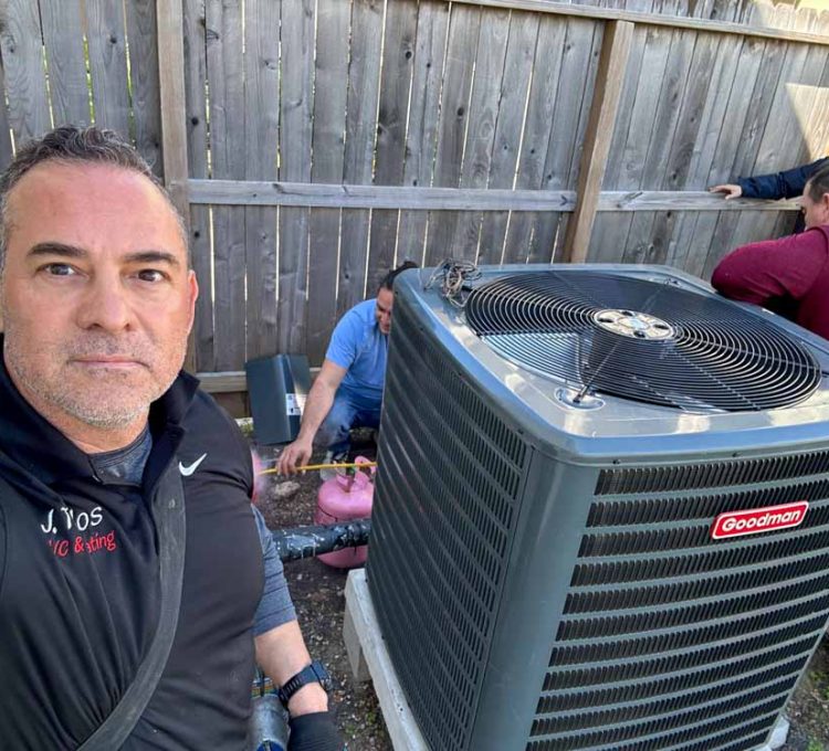 Skilled HVAC professional testing AC system performance with advanced diagnostic equipment