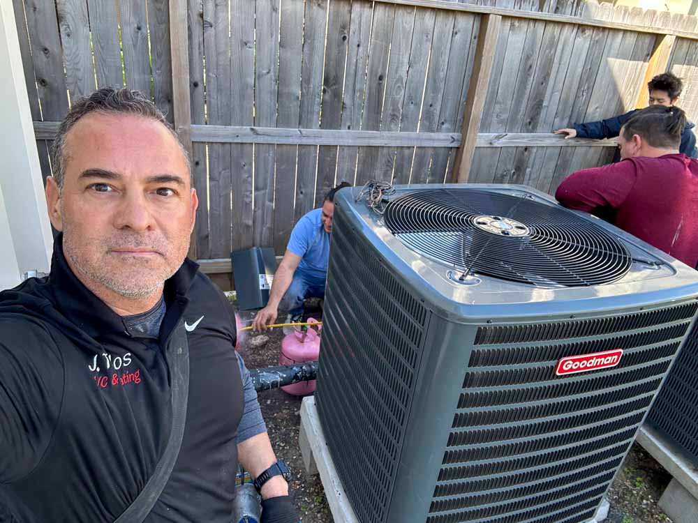 Skilled HVAC professional testing AC system performance with advanced diagnostic equipment