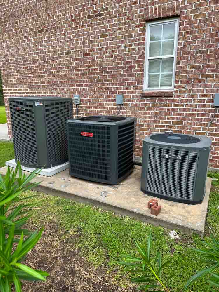 An expert air conditioning contractor in Galveston, TX, performing a detailed system efficiency check